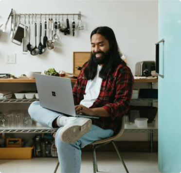 Professional using a laptop during onboarding work